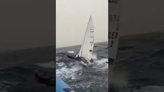 Huge waves + mini sailboat = Crazy sailing