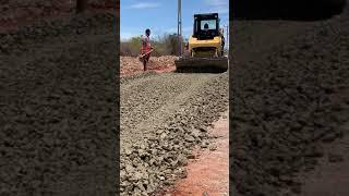 Sub base laying||Spreading Aggregate base course||Road construction #shorts
