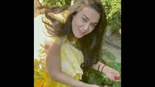 Preety Zinta plucking  strawberry in her garden