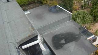 Flat roof with a puddle in the middle