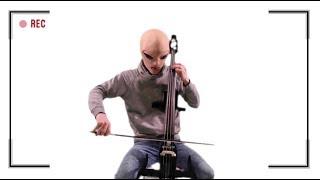 An alien playing Cello by GRAViiTY