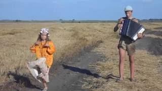 На баяне\Russian Kid playing the accordion while his sister is lost in dance, Accordion Harmonica