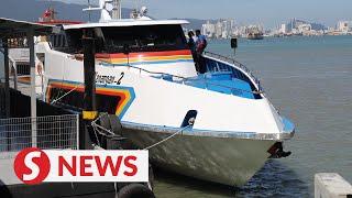 Only 10 minutes to cross Penang channel on fast boat ferries