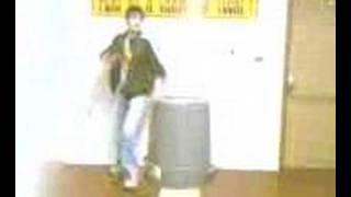 tall lanky dude kicks trash can