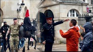 ANGRY BOSS & SOLDIER SCREAMED, but guard uses his horse and LOUD VOICE to move the tourists away