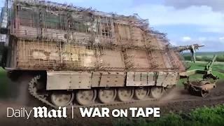 Why Russia is Putting Armoured Shells on its Tanks | War on Tape | Daily Mail