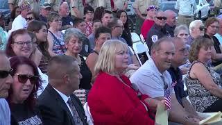 Guy rides his bike through 9/11 Ceremony