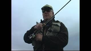 Fly Fishing legend and  guru  Mike Lawson  demonstrates the proper technique in  landing large fish.