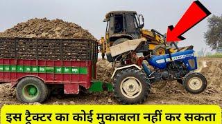 Five Stars Swaraj 744 XT Tractor is pulling a trolley loaded with soil