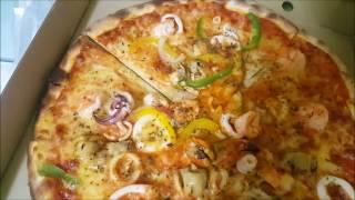 PORTO ROMANO SEAFOOD PIZZA THE BEST PIZZA IN TOWN! GUARENTEED SATISFACTION!