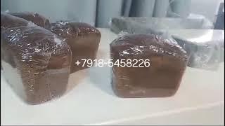 Упаковочный автомат для упаковки хлеба в термоусадочную плёнку.