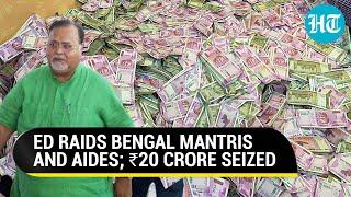 In pics: ₹20 crore cash seized from Bengal minister's aide as ED conducts raids in SSC scam