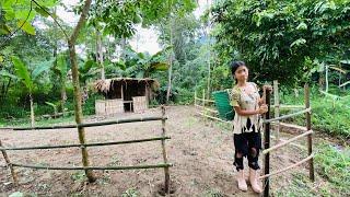 Orphaned girl repairs house and fences around to prepare for cold winter