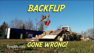 BACKFLIP OVER THE WOOD PILE!!! OUCH!!!