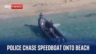 Spain: Suspected drugs runners land speedboat on Mallorca beach during dramatic police chase