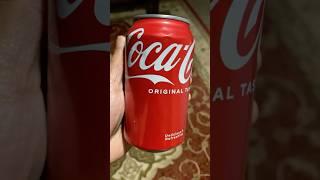 A quarter-filled coca-cola can…