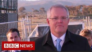 Australian man interrupts PM Morrison to say 'get off my lawn' - BBC News