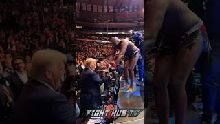 Jon Jones gives Trump his UFC belt after Miocic win!