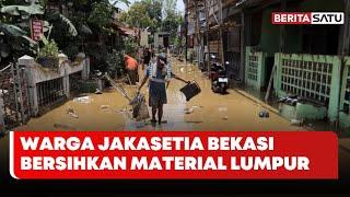 Warga Jakasetia Bekasi Bersihkan Material Lumpur | Beritasatu