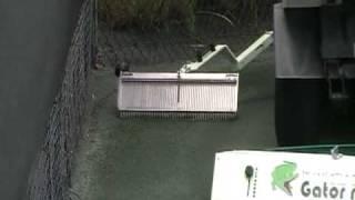 Tennis The Gator rake Strikes Again