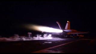 F-18 Hornets Conduct Carrier Operations In The Dark Of Night