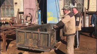 саморазгружающийся контейнер. Аналогов в России нет.