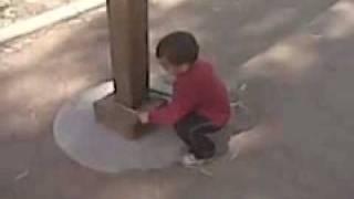 AMAZING 2 YEAR OLD PLAYING  DRUMS ON AN ELECTRICITY   POLE