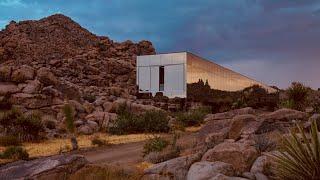 Mirror-clad Invisible House reflects its desert surrounds