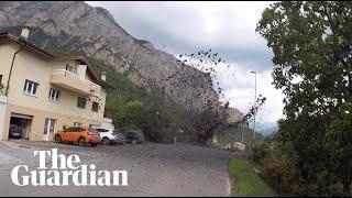 Mudslide sweeps into Swiss village