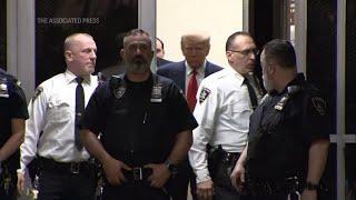 Trump, under arrest, appears in New York court