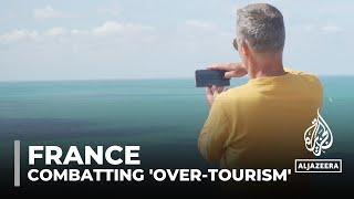 French government launches new strategy to deal with 'over-tourism'