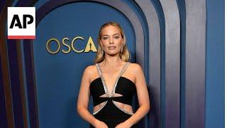 Margot Robbie, Emma Stone, Zac Efron at Governors Awards red carpet