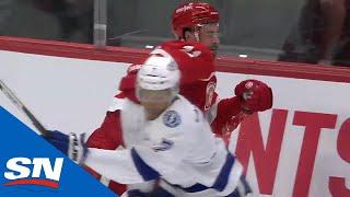 Dylan Larkin Takes A Swing At Mathieu Joseph After Hit Into The Boards