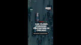 Car plows through protesters in Chicago
