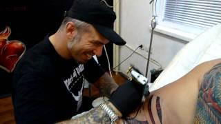 Stu getting tattooed