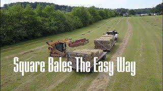 Collecting square bales with a accumulator/grappler.