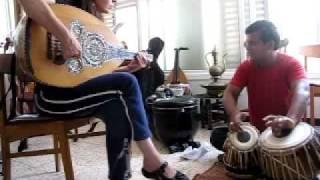 ravi tripathi on tabla playing with marina tushich on oud