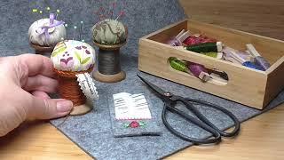 Make an easy pin cushion with a vintage cotton reel, some cotton fabric and embroidery thread