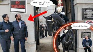 "LOVE THIS LADY GUARD"! Two tourists got told off to Step Back behind the line!