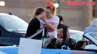 JoJo Siwa kisses girlfriend and holds hands at outdoor concert