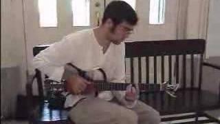 Romantic guitar solo for a warm up. Compact silent guitar Aria Sinsonido