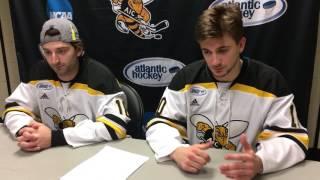 Blake Christensen and Martin Mellberg after AIC win against Niagara