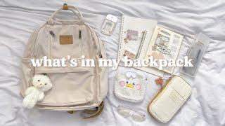 what’s in my backpack  beige and minimalistic 