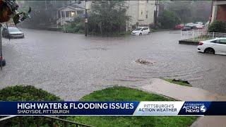 Shadyside street flooded during heavy rainfall in Pittsburgh