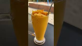 Tasty Mangoshake with mango cubes