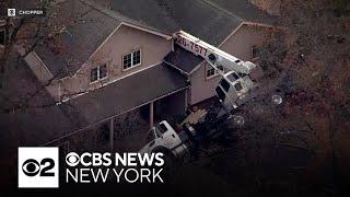 Crane crashes onto home in Morris County, New Jersey