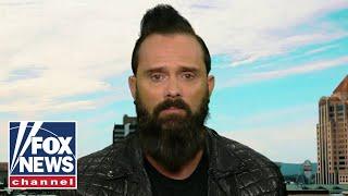 Skillet's John Cooper warns wokeness is subject to power in a 'totalizing ideology'