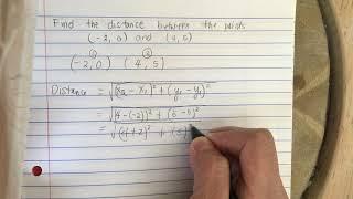 Find the distance between the points (-2,0) and (4,5)