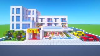 Minecraft Tutorial: How To Make A Modern Hotel With a Roof Pool "2021 City Builds"