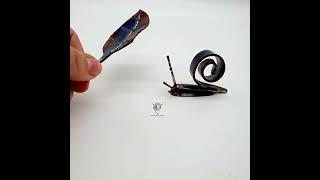 Recycled cutlery Snail. 